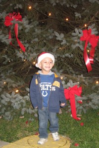 Jace in front of the Town tree